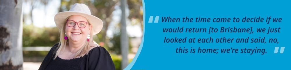 Peta standing and smiling outside with a hat on, accompanied by the quote, “When the time came to decide if we would return [to Brisbane], we just looked at each other and said, no, this is home; we’re staying.”