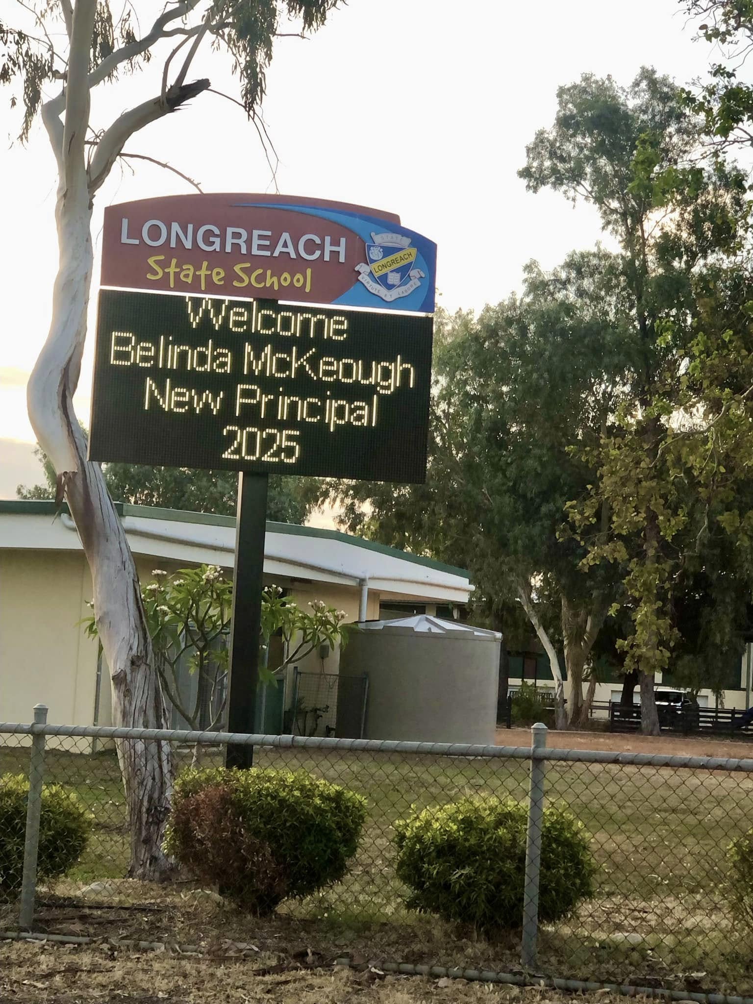 School sign that says "Longreach State School: Welcome Belinda McKeough New Principal 2025"