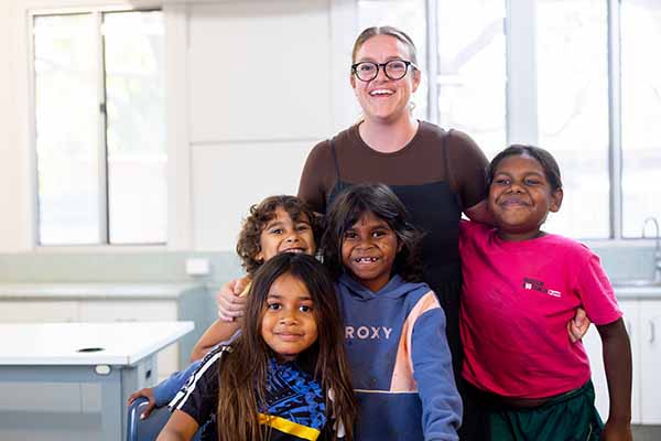 Teacher with students