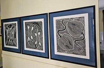 Photo of Vanessa Hudson's lino prints displayed in Kerri's house